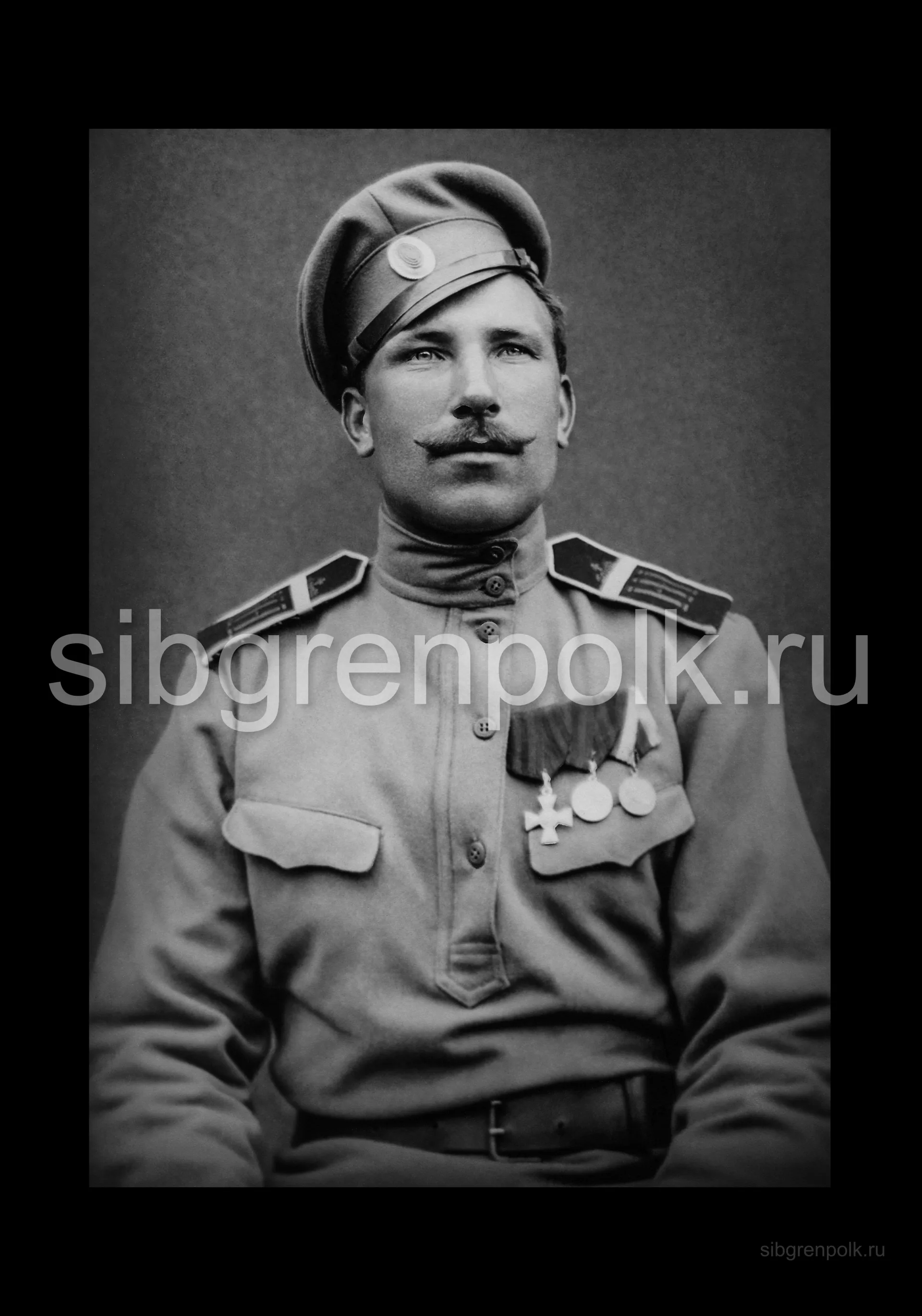 Младший унтер-офицер Георгиевский кавалер Козыренко Афанасий, награжден знаком отличия Военного ордена «Георгиевский крест» 4-й степени №99193 Верховным Главнокомандующим Его Императорским Высочеством Великим Князем Николаем Николаевичем, за отличия, оказанные в боях 22-го и 23.06.1915 г. (РГАКФД)