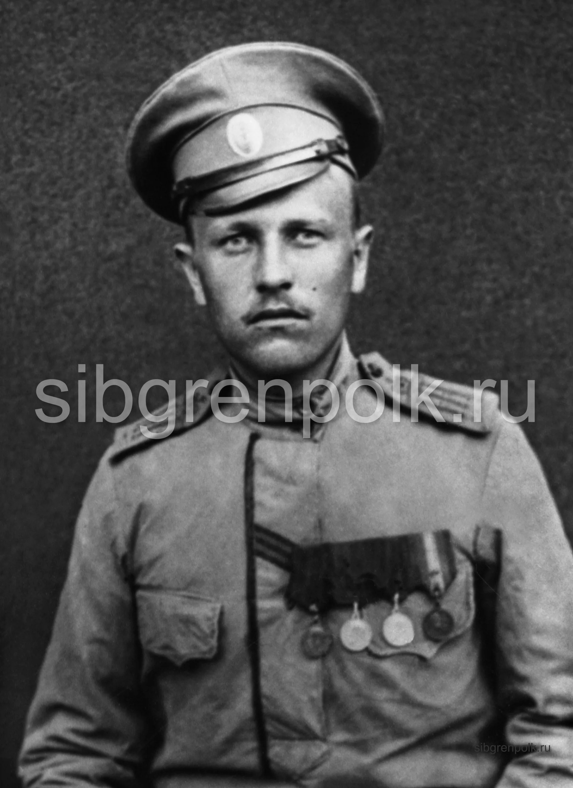 Георгиевский кавалер, ефрейтор команды конной разведки ефрейтор Сенин, награжден георгиевскими медалями «за храбрость» IV, III и II степеней. (РГАКФД)
